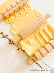 Set of 3 Patterned Rolling Pins: Wooden rolling pins with various patterns for creative play.