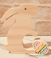 Handmade wooden bunny and egg set, a charming Easter-themed decor or playtime accessory.