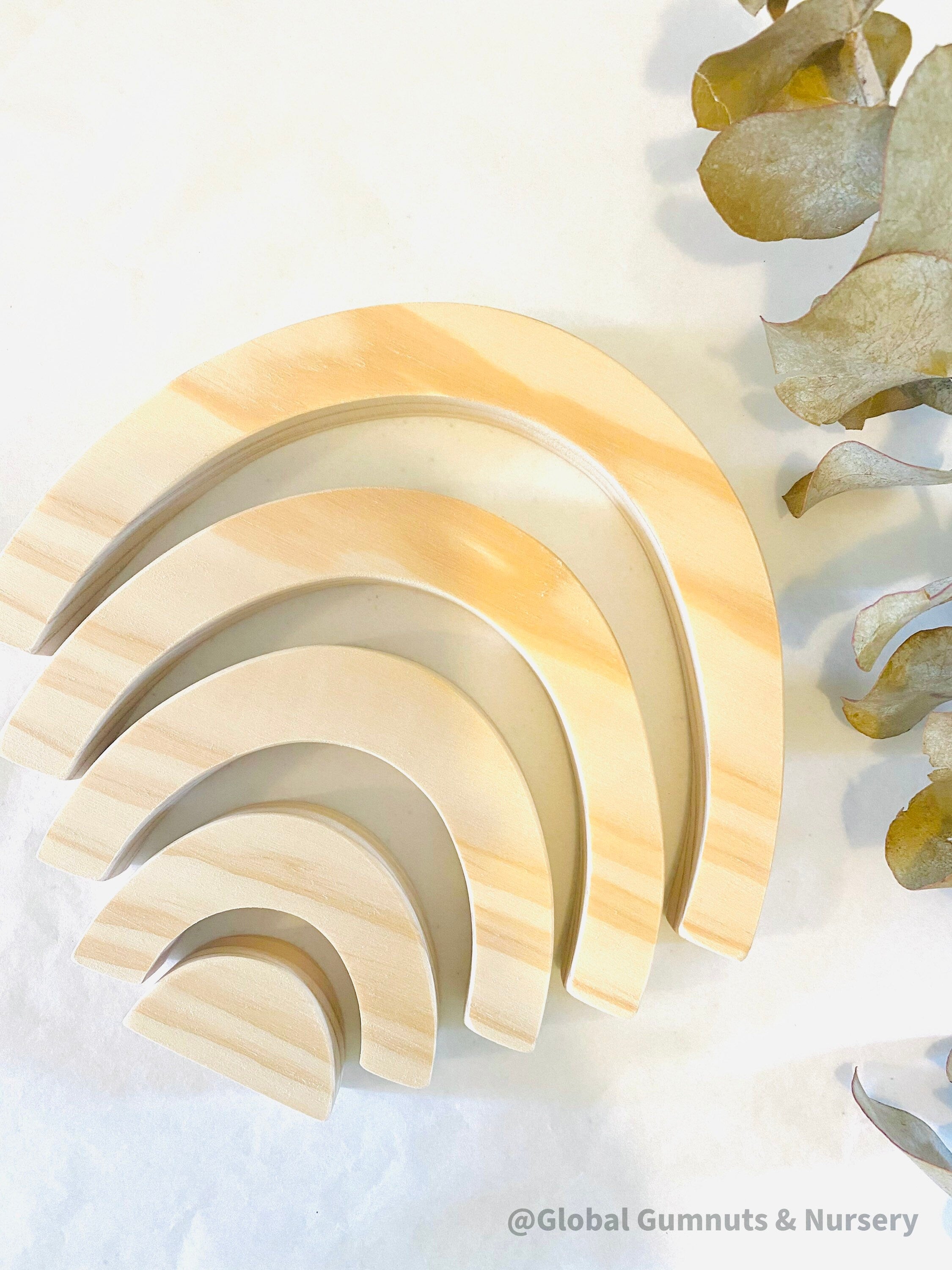 Rainbow Wooden Stacker: Eco-friendly handmade rainbow stacker for creative play.