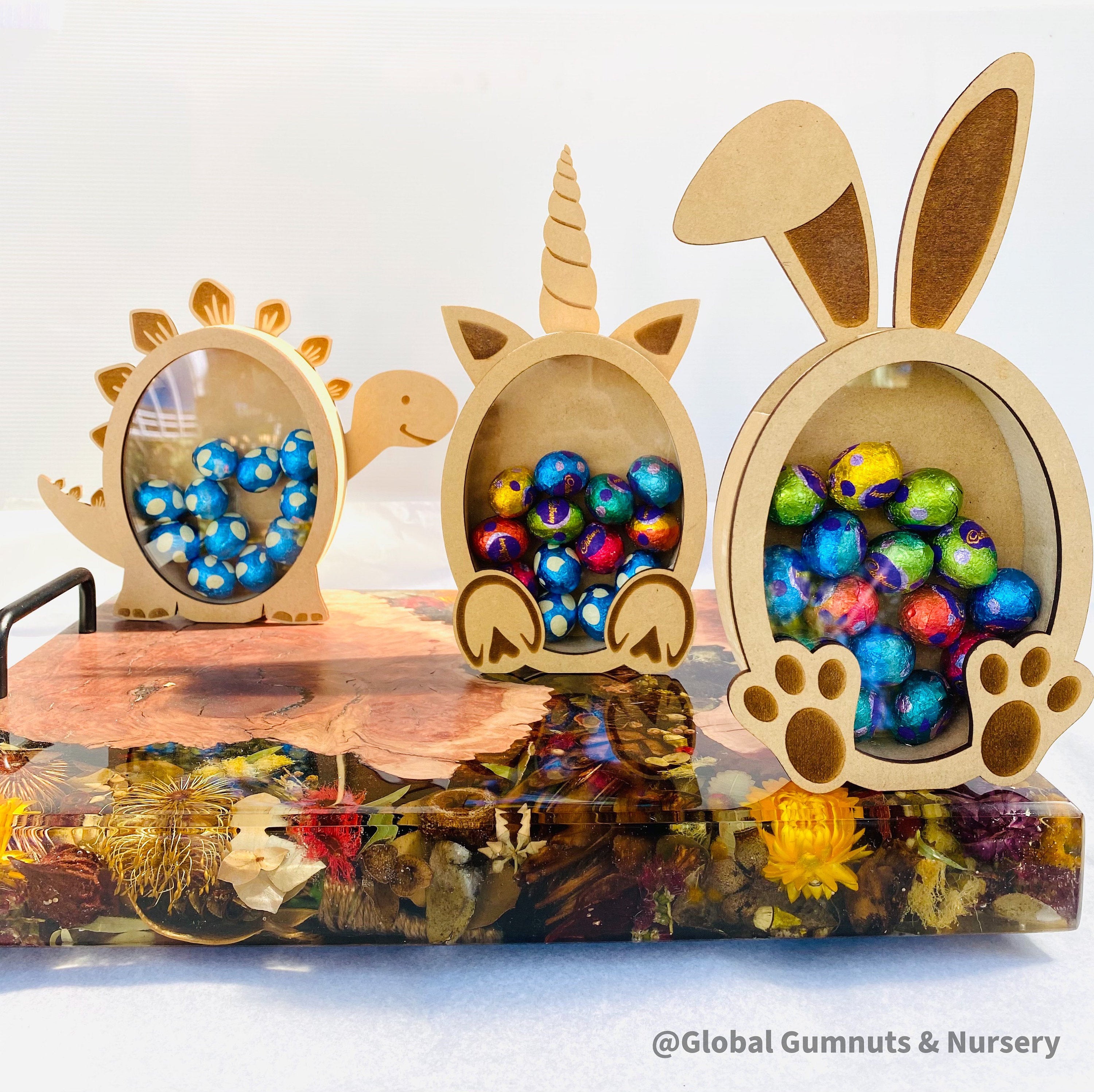 Bunny Rabbit Easter Egg Drops Piggy Bank: Rabbit-themed money box perfect for Easter gifts.