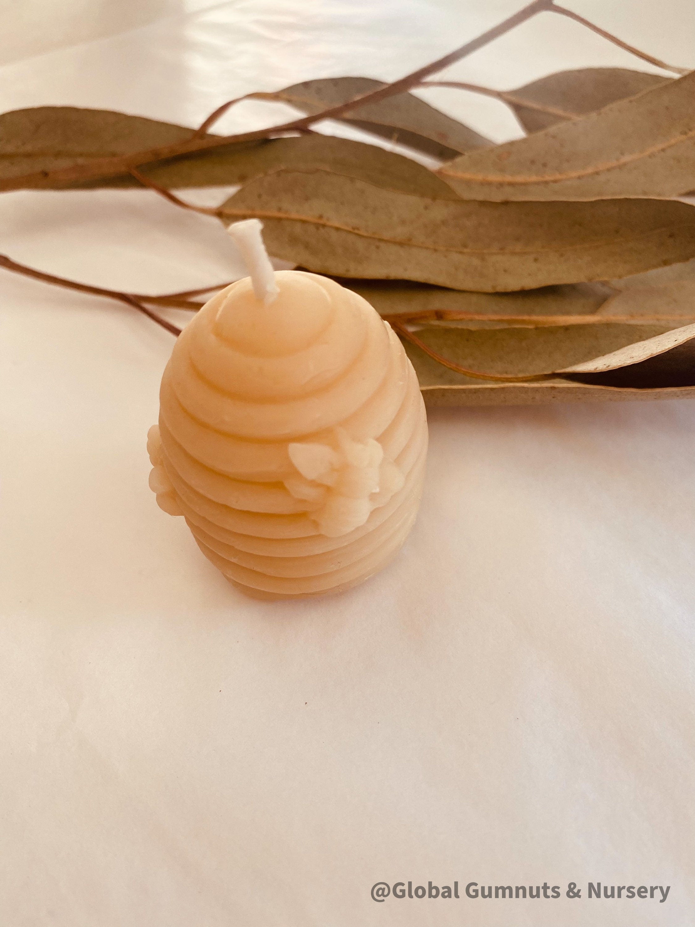 Natural beeswax candles, combining eco-friendly elegance with a warm glow.