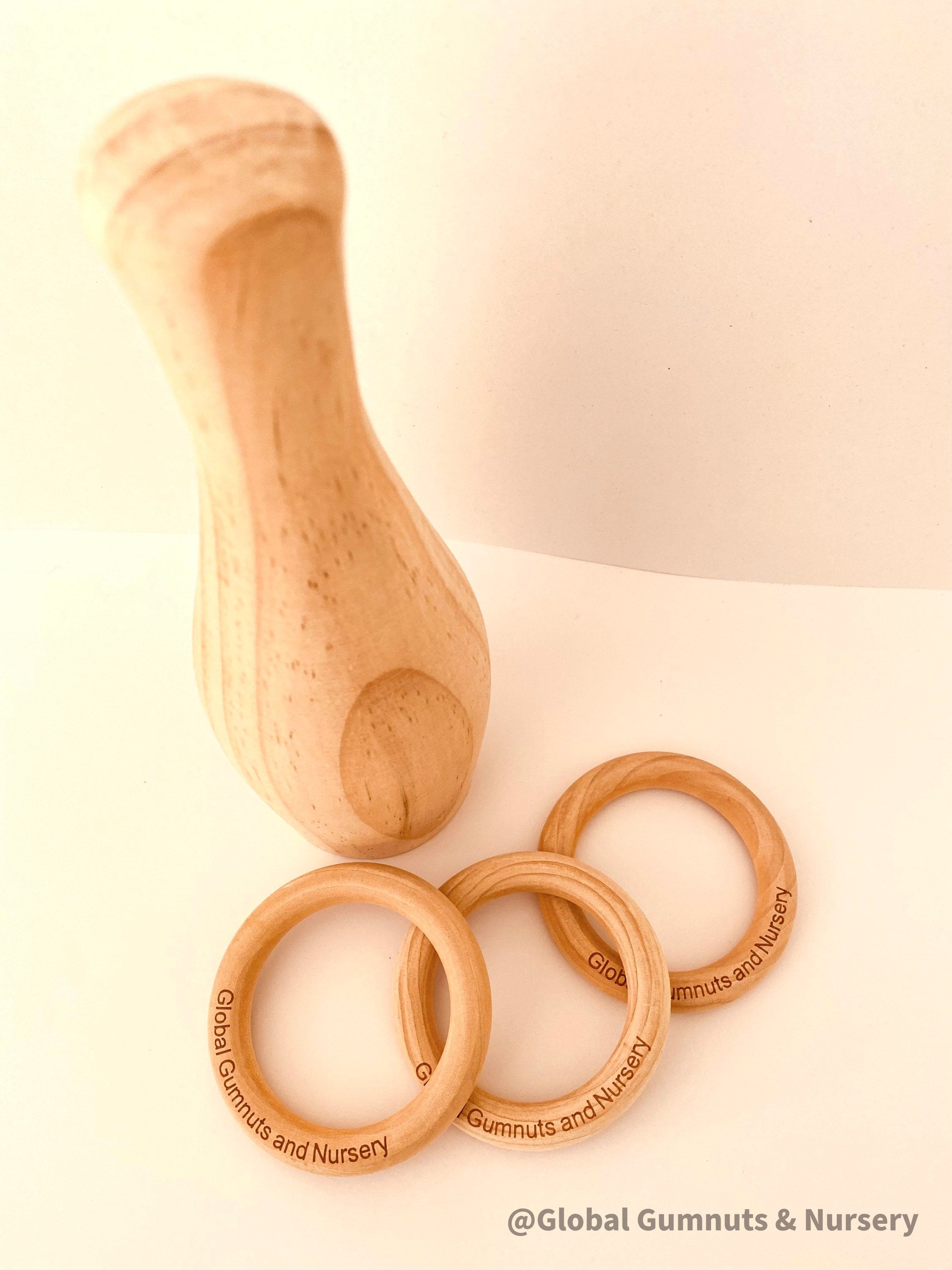Natural Wooden Bowling Pin Set: Handmade in Western Australia, ideal for ring toss games.