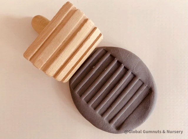 Set of 3 Wooden Stamp Play Tools: Three-piece wooden stamp play tool set designed for sensory and creative play with clay, dough, or patterns.