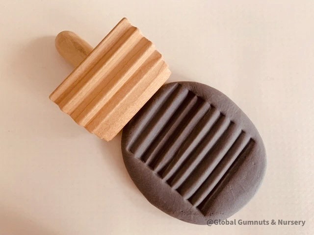 Set of 3 Wooden Stamp Play Tools: Three-piece wooden stamp play tool set designed for sensory and creative play with clay, dough, or patterns.