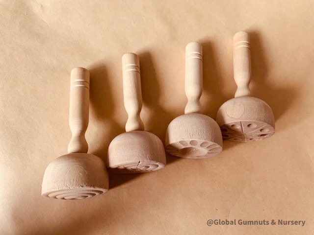 Round Patterned Wooden Stamper: Wooden stamp with unique patterns, ideal for clay, pottery, or dough play, adding texture and creativity.