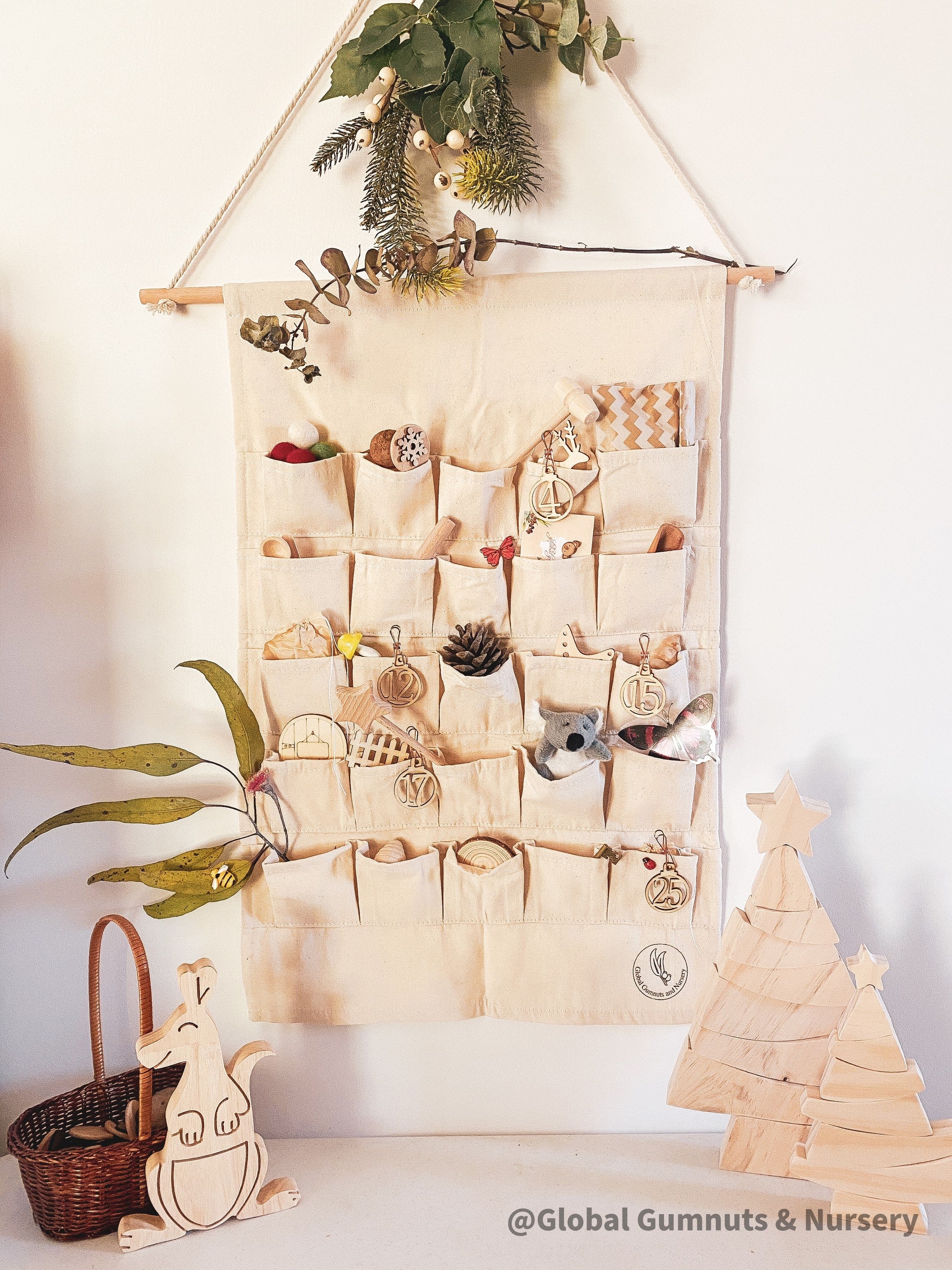 Linen Advent Calendar: Advent calendar with wooden numbers and festive design.