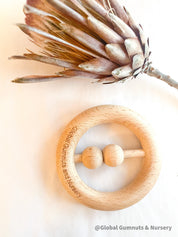 Natural baby rattle, a beautifully crafted, eco-friendly toy for little ones.