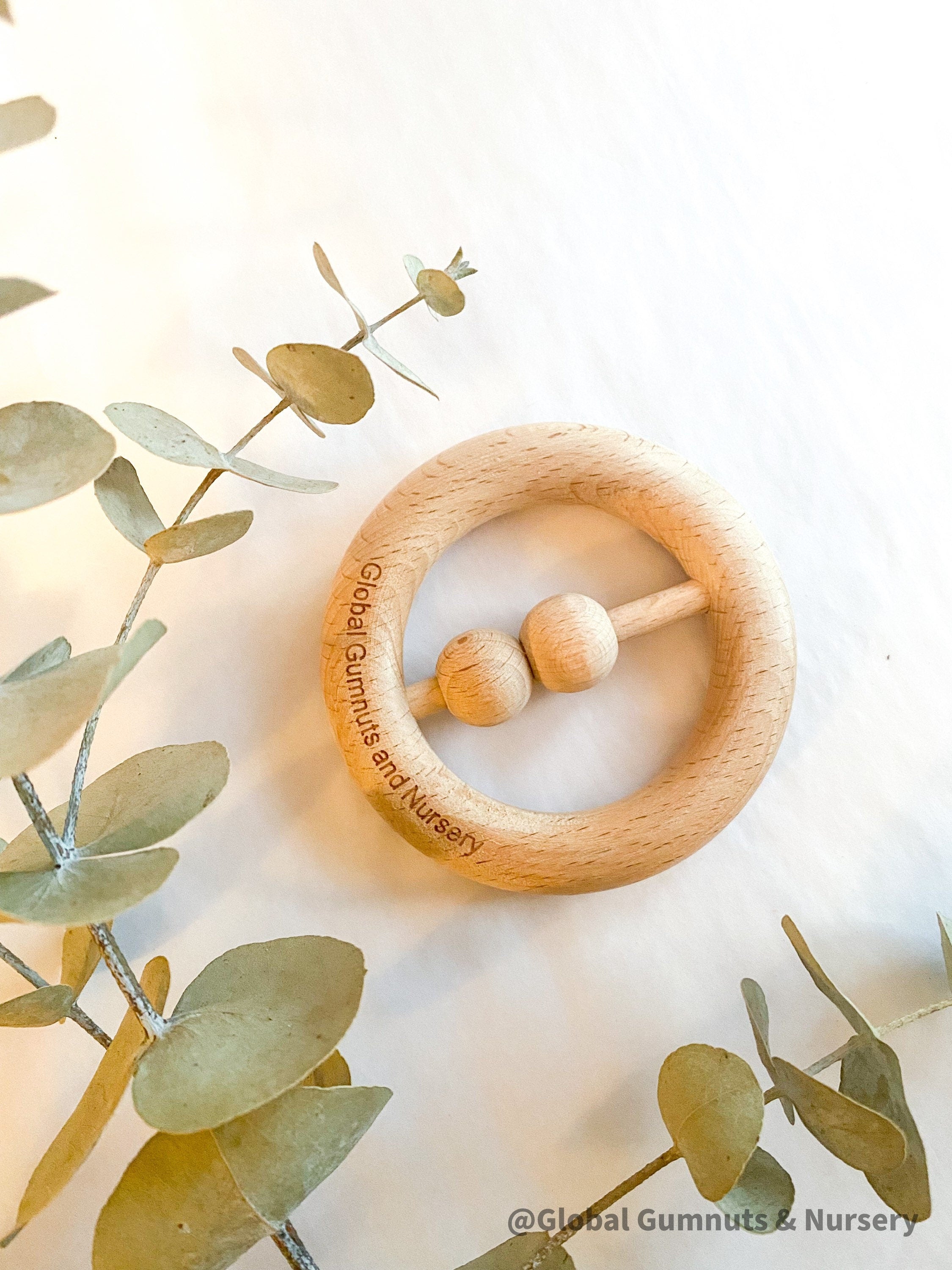 Natural baby rattle, a beautifully crafted, eco-friendly toy for little ones.