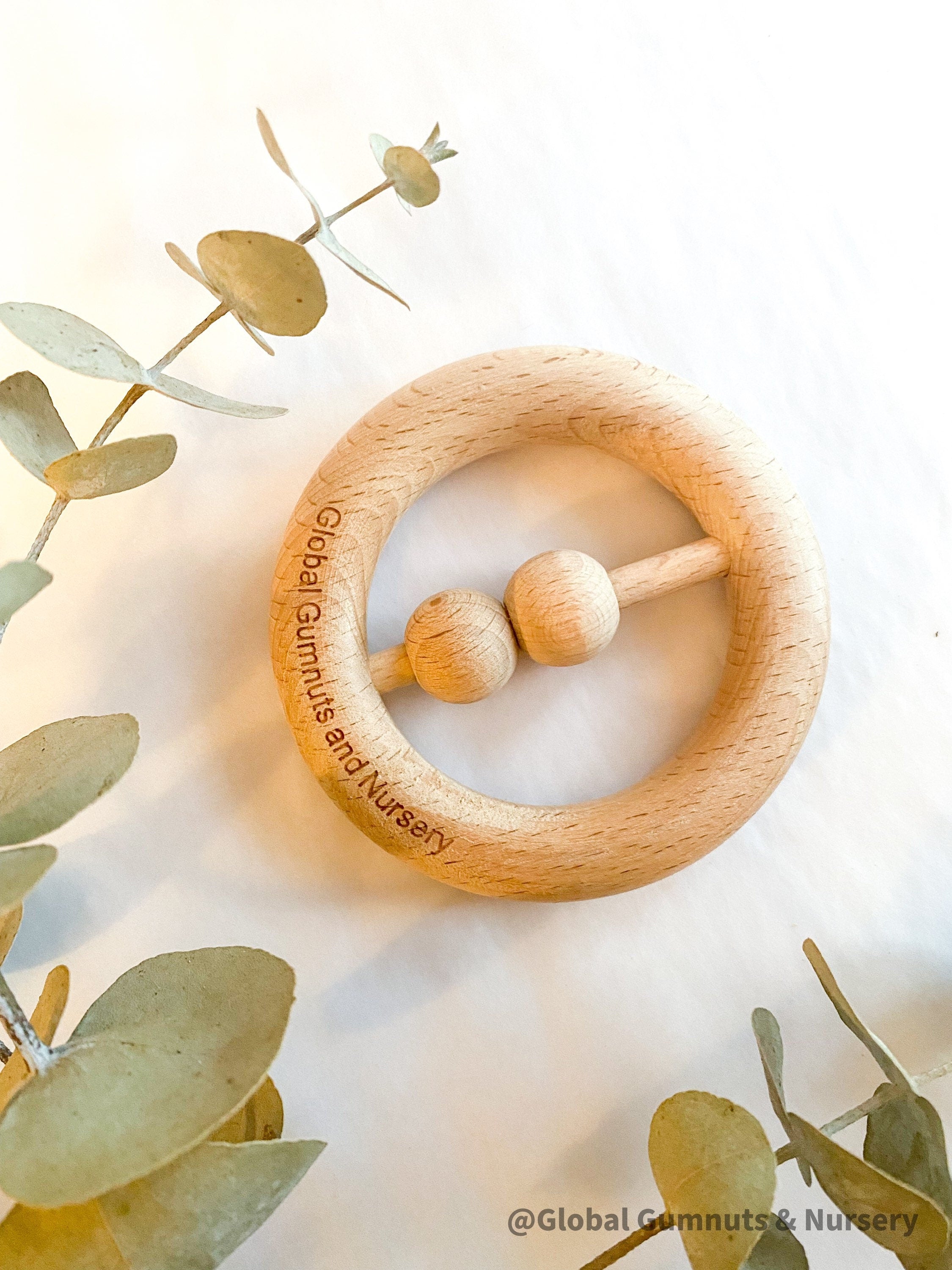 Natural baby rattle, a beautifully crafted, eco-friendly toy for little ones.