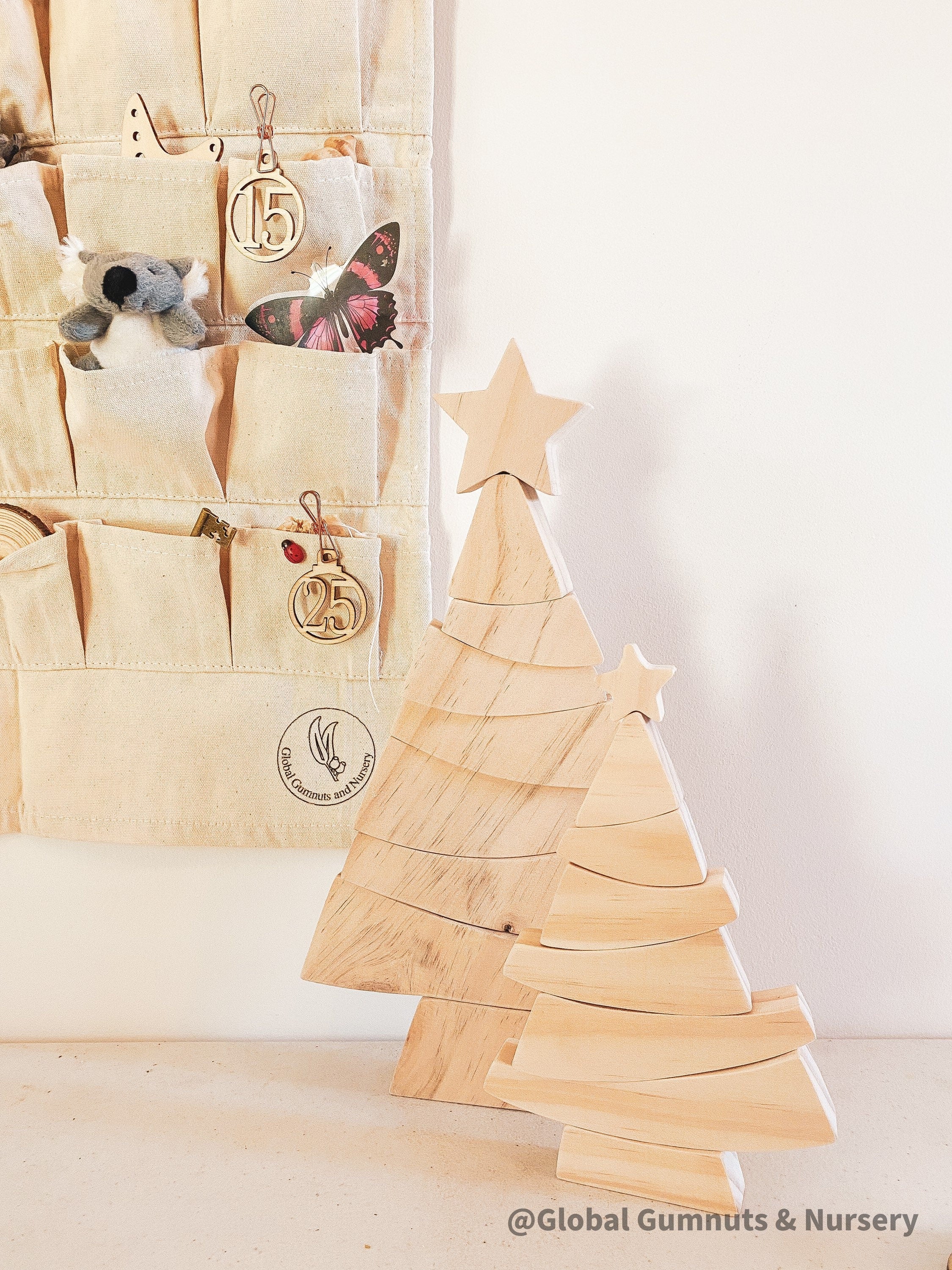 Linen Advent Calendar: Advent calendar with wooden numbers and festive design.