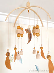 Australian Felt Gumleaf Mobile: Handmade Australian gumleaf mobile with dark wooden beads, inspired by native nature.