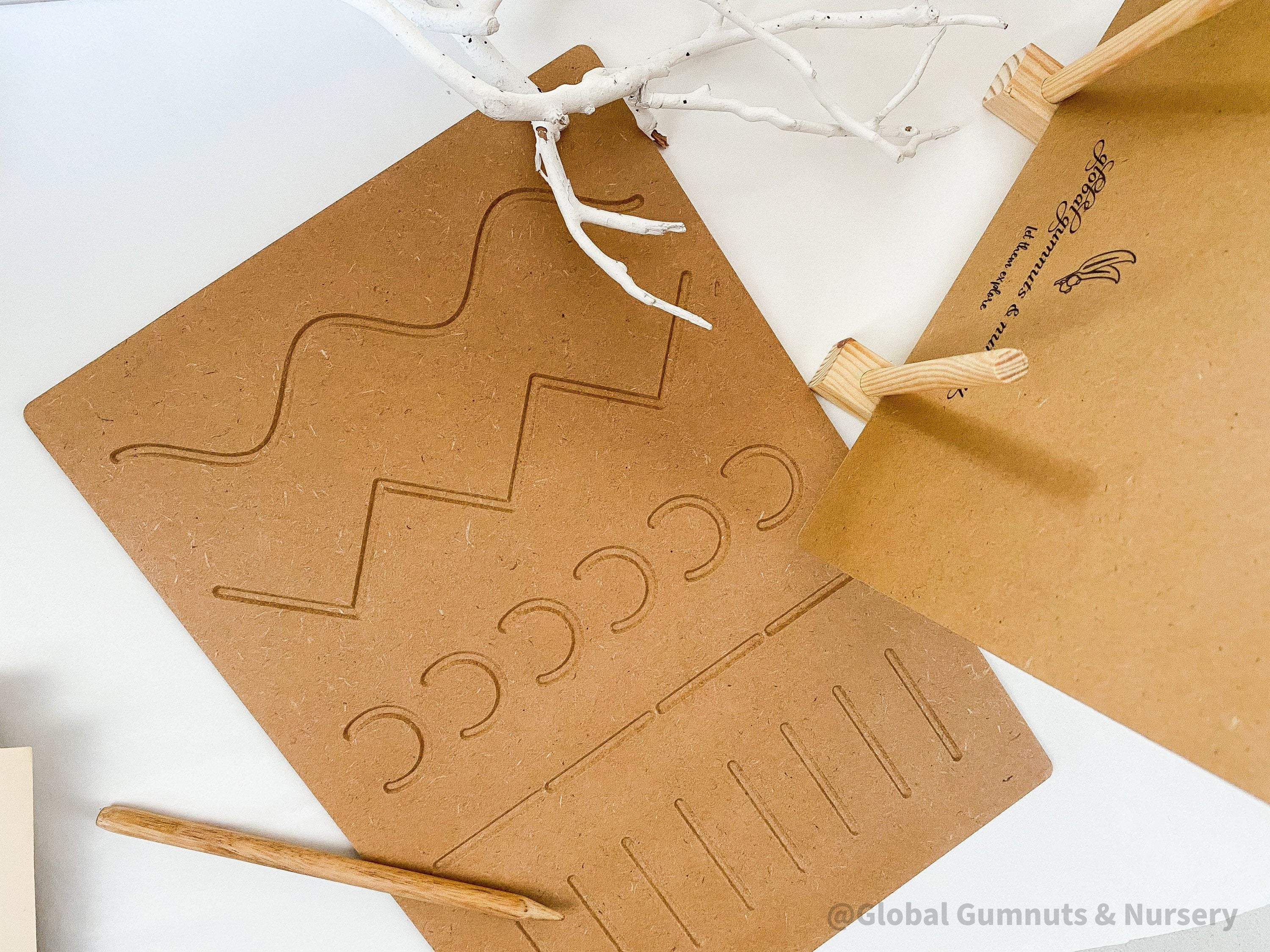 Patterns Tracing Board: Tracing board with wooden stylus for pre-writing practice.