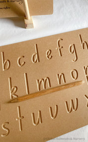 Lowercase Wooden Tracing Board: Board and stylus for letter tracing and writing practice.