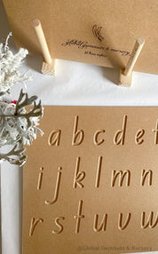 Lowercase Wooden Tracing Board: Board and stylus for letter tracing and writing practice.