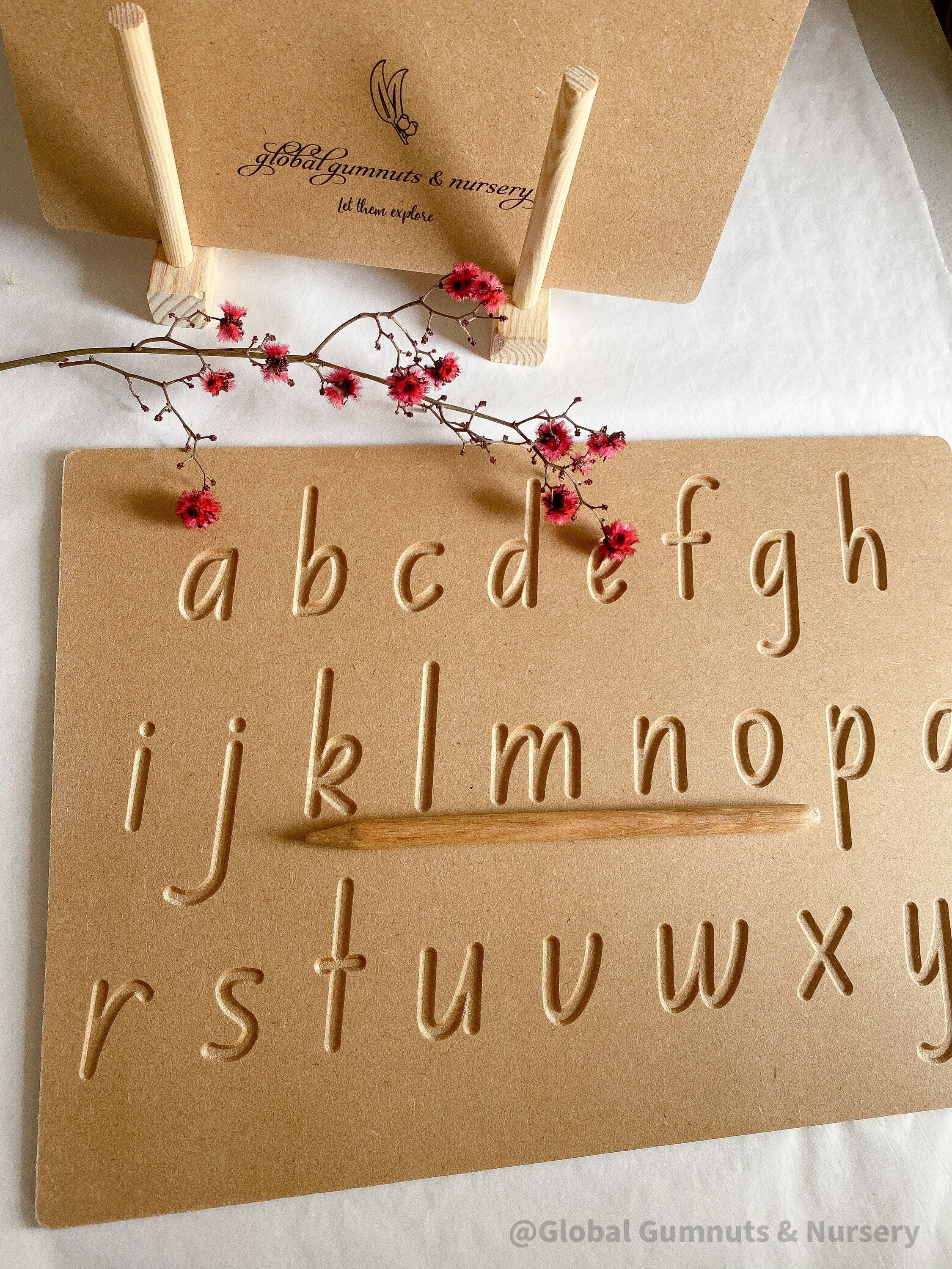 Lowercase Wooden Tracing Board: Board and stylus for letter tracing and writing practice.