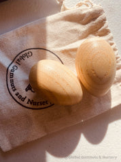 Wooden egg shakers, available individually or as a set of 2, perfect for Easter or musical fun.