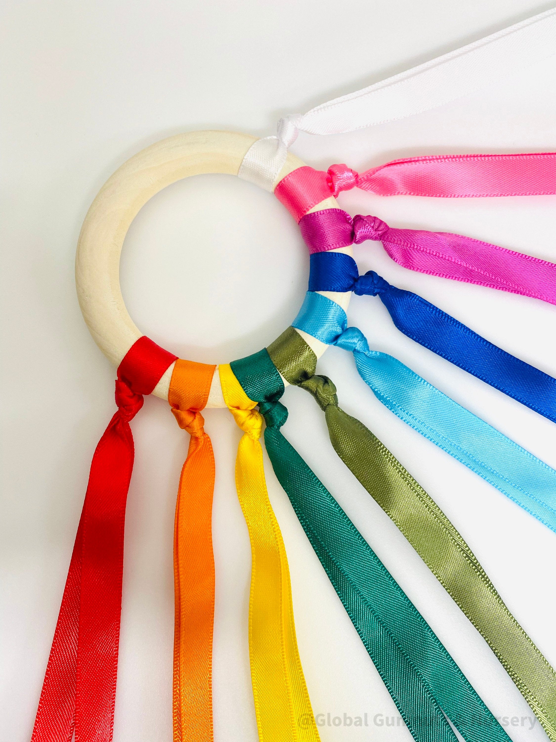 Rainbow Bells – Dancing Ribbons: Musical ribbons with bells for colourful play.