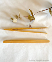 wooden baby tongs: early learning tongs for developing fine motor skills.