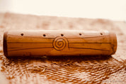 Natural cylindrical music shaker (22.5x6.5cm), a versatile percussion instrument.