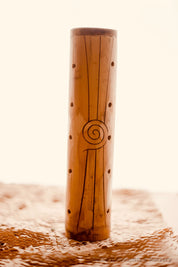 Natural cylindrical music shaker (22.5x6.5cm), a versatile percussion instrument.