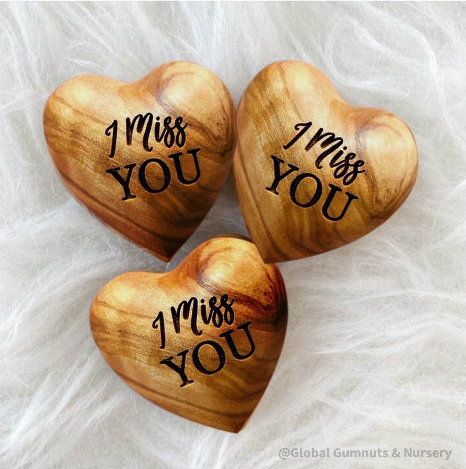 Gift a wooden heart with "I Miss You" sentiment, a thoughtful keepsake to send love and warm wishes.