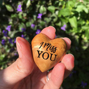 Gift a wooden heart with "I Miss You" sentiment, a thoughtful keepsake to send love and warm wishes.