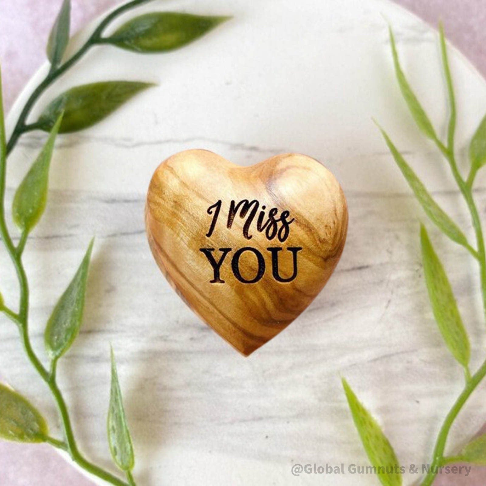 Gift a wooden heart with "I Miss You" sentiment, a thoughtful keepsake to send love and warm wishes.