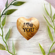Gift a wooden heart with "I Miss You" sentiment, a thoughtful keepsake to send love and warm wishes.