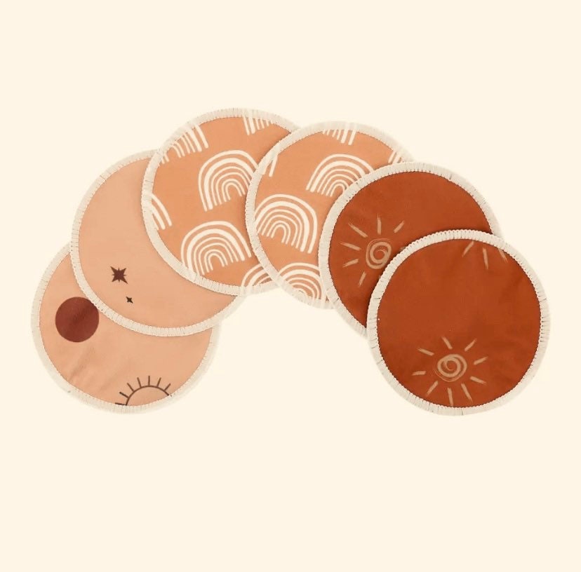 Bamboo nursing pads, eco-friendly breastfeeding essentials offering comfort and protection (12cm).