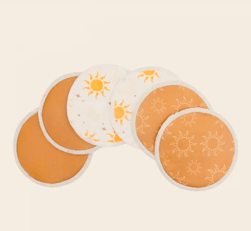 Bamboo nursing pads, eco-friendly breastfeeding essentials offering comfort and protection (12cm).