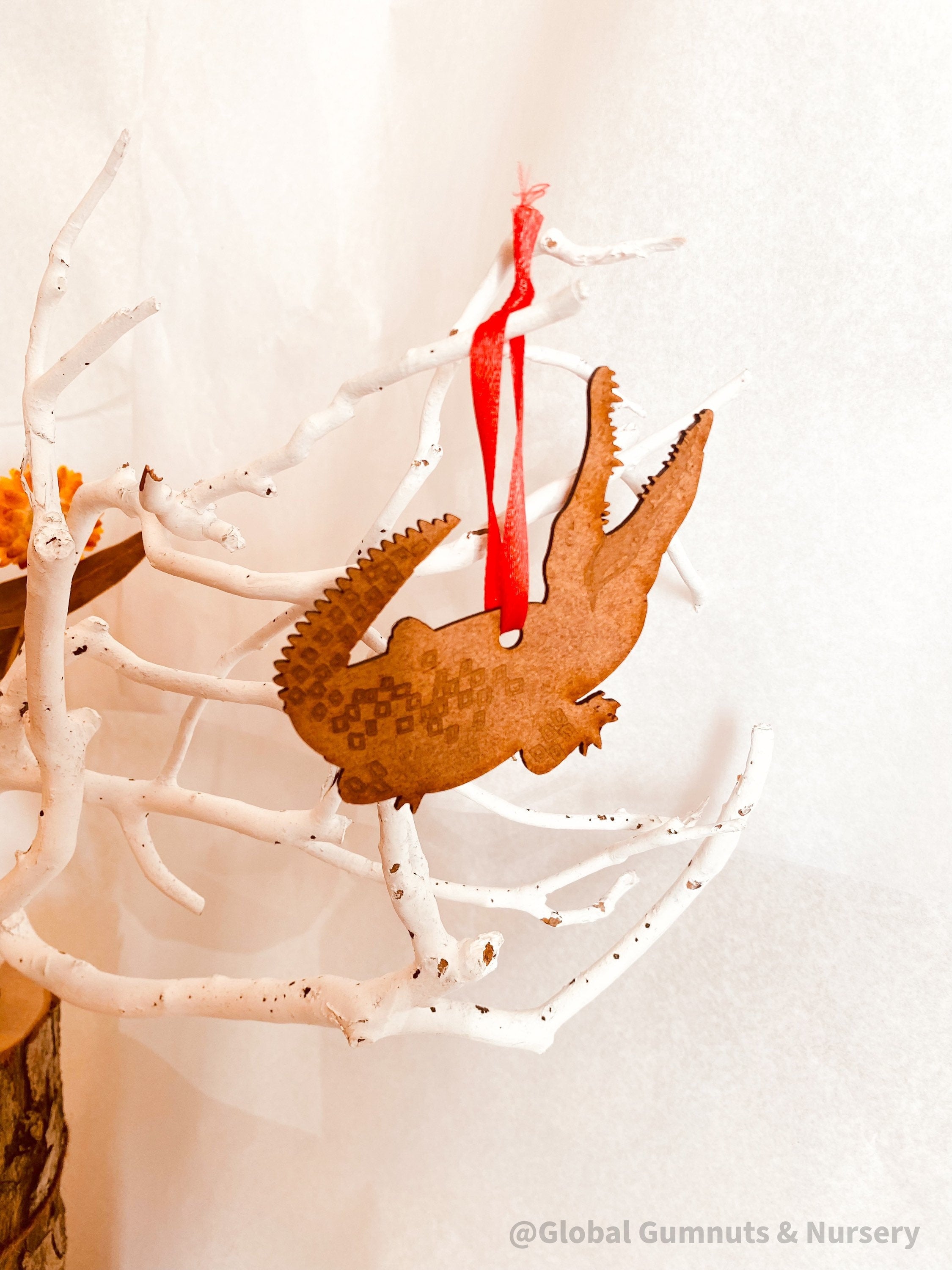 GRUMPY Crocodile Ornament: Crocodile ornament for Australian-themed holiday decor.