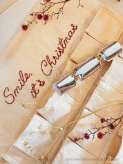 Linen Advent Calendar: Advent calendar with wooden numbers and festive design.