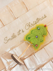 Linen Advent Calendar: Advent calendar with wooden numbers and festive design.