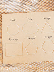 Shapes Wooden Tracing Board: Learn shapes with a board, matching pieces, and stylus.