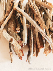 Natural driftwood pieces, versatile for crafts, decor, or beach-themed designs.