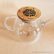 Teacher’s gift glass teapot with wooden lid, Scandi-style elegance for tea time.