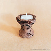 medium banksia tea light candle: natural banksia pod holder for tealight candles.