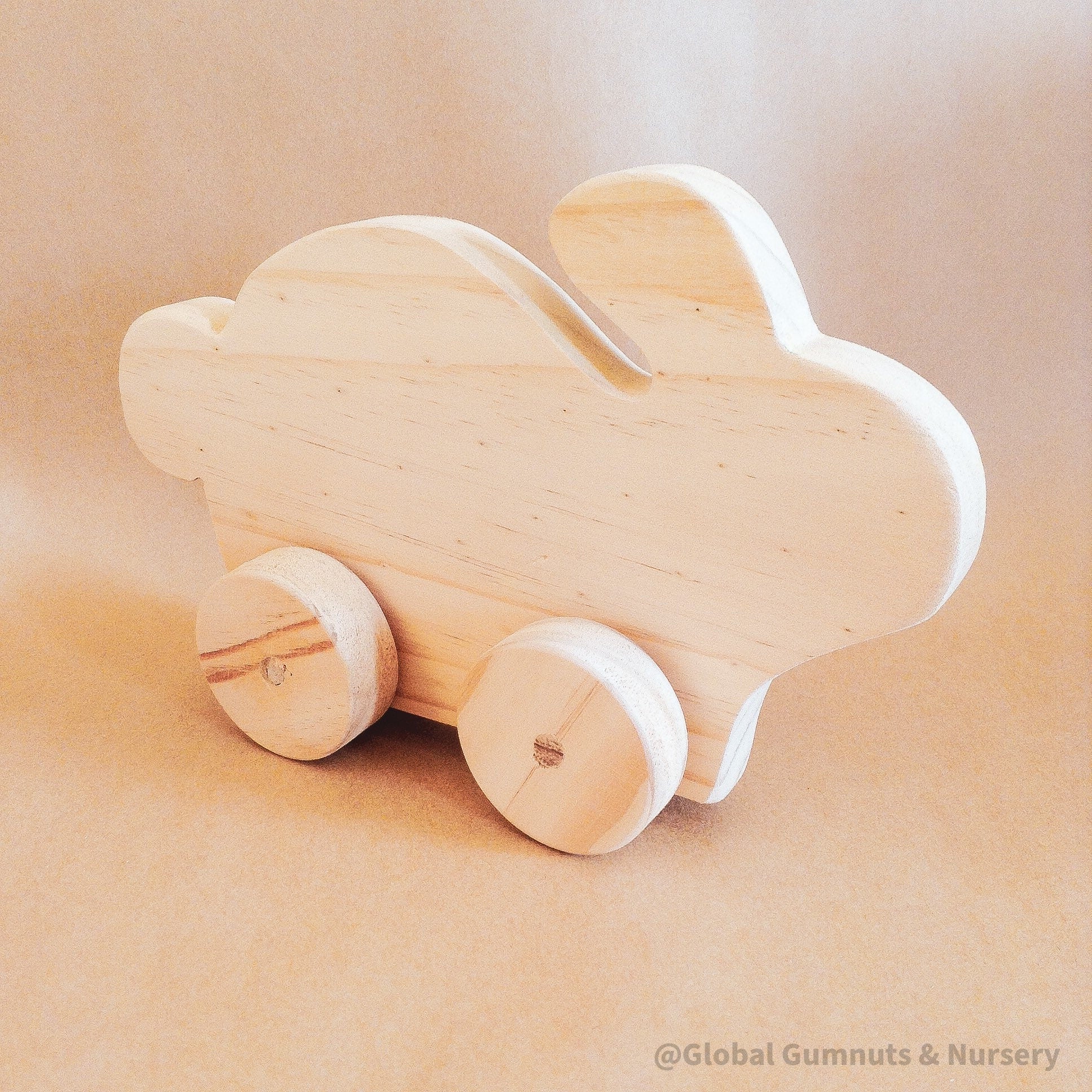 Handmade Wooden Bunny: Wooden bunny for Easter-themed play or decoration.