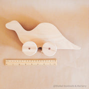 Personalized Dinosaur Toy: Eco-friendly wooden dinosaur toy for toddlers with custom options.