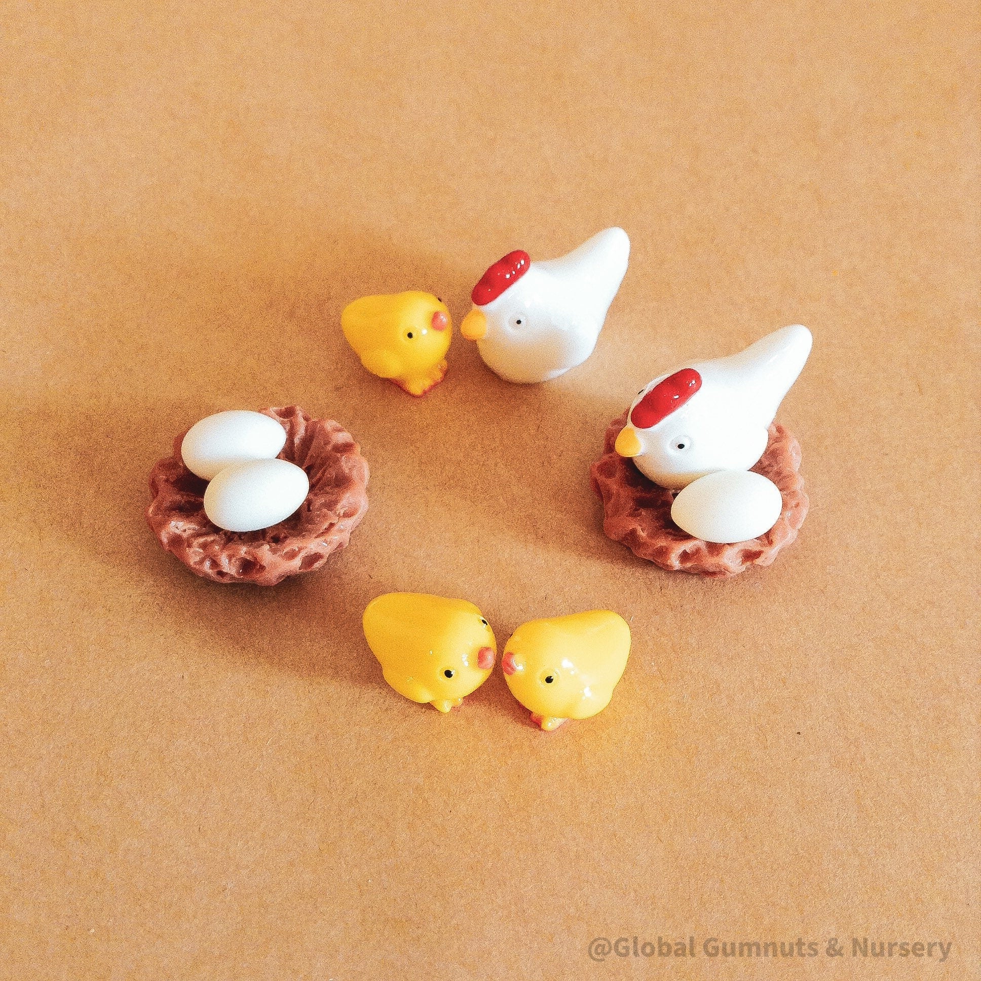 resin chickens & chicks set: mini resin chicken family set, perfect for crafting or farm-themed decor.