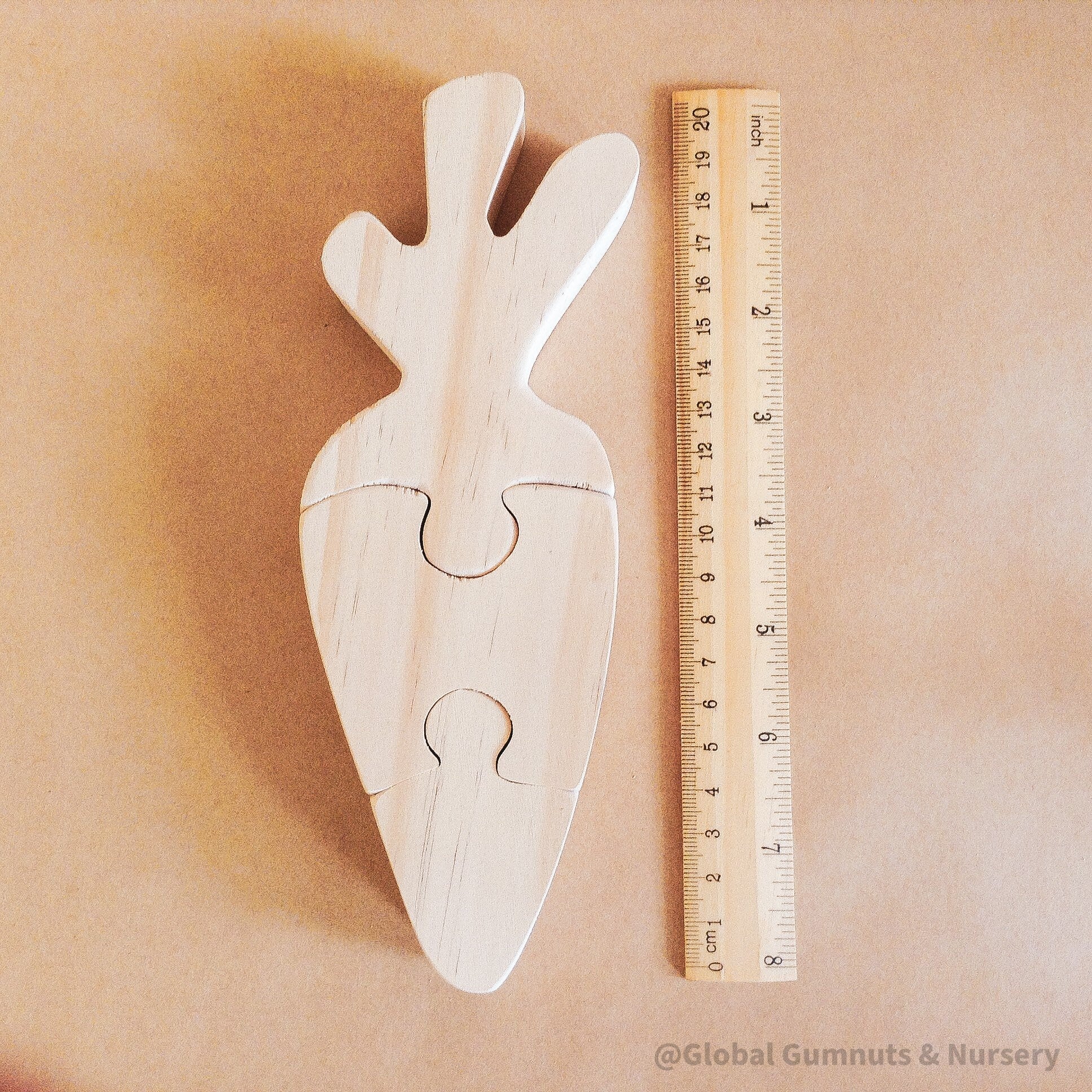 Handmade Wooden Carrot Puzzle: Three-piece wooden puzzle shaped like a carrot.