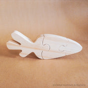 Handmade Wooden Carrot Puzzle: Three-piece wooden puzzle shaped like a carrot.