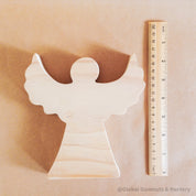 Handmade Wooden Angel: Wooden angel with movable wings, ideal for decor or gifts.