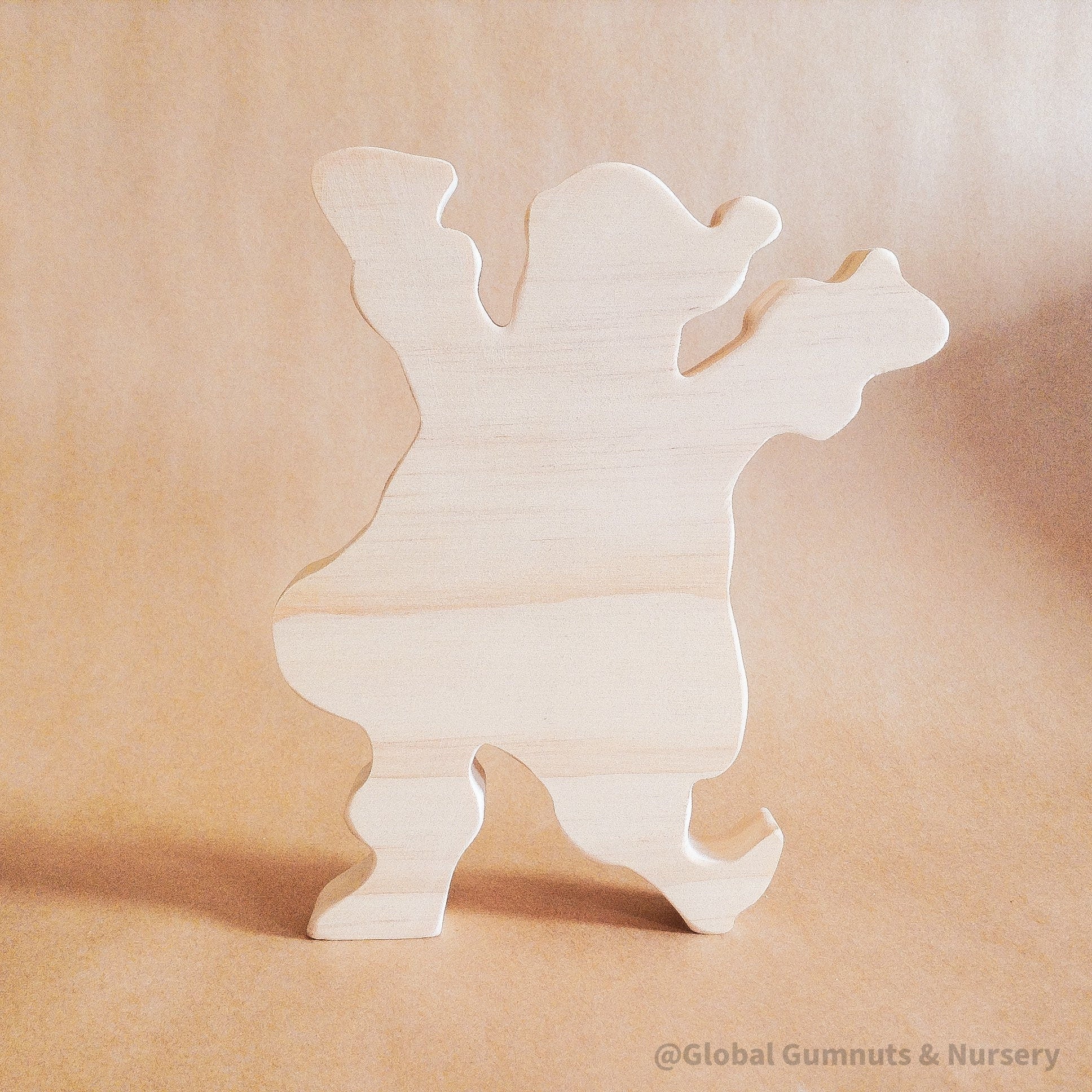 Free Standing Wooden Santa Decor: Wooden Santa figure for standing Christmas decor, handcrafted for festive displays.