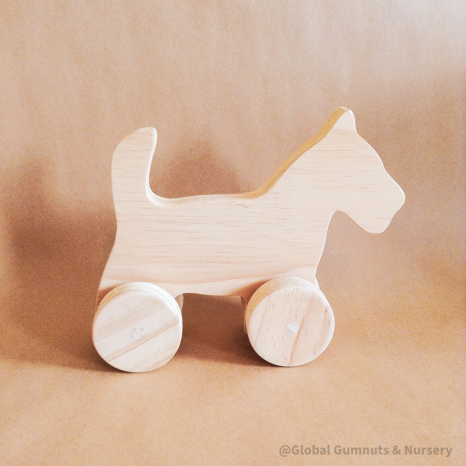 Handmade wooden dog figurine, a playful toy and thoughtful first gift for animal-loving children.