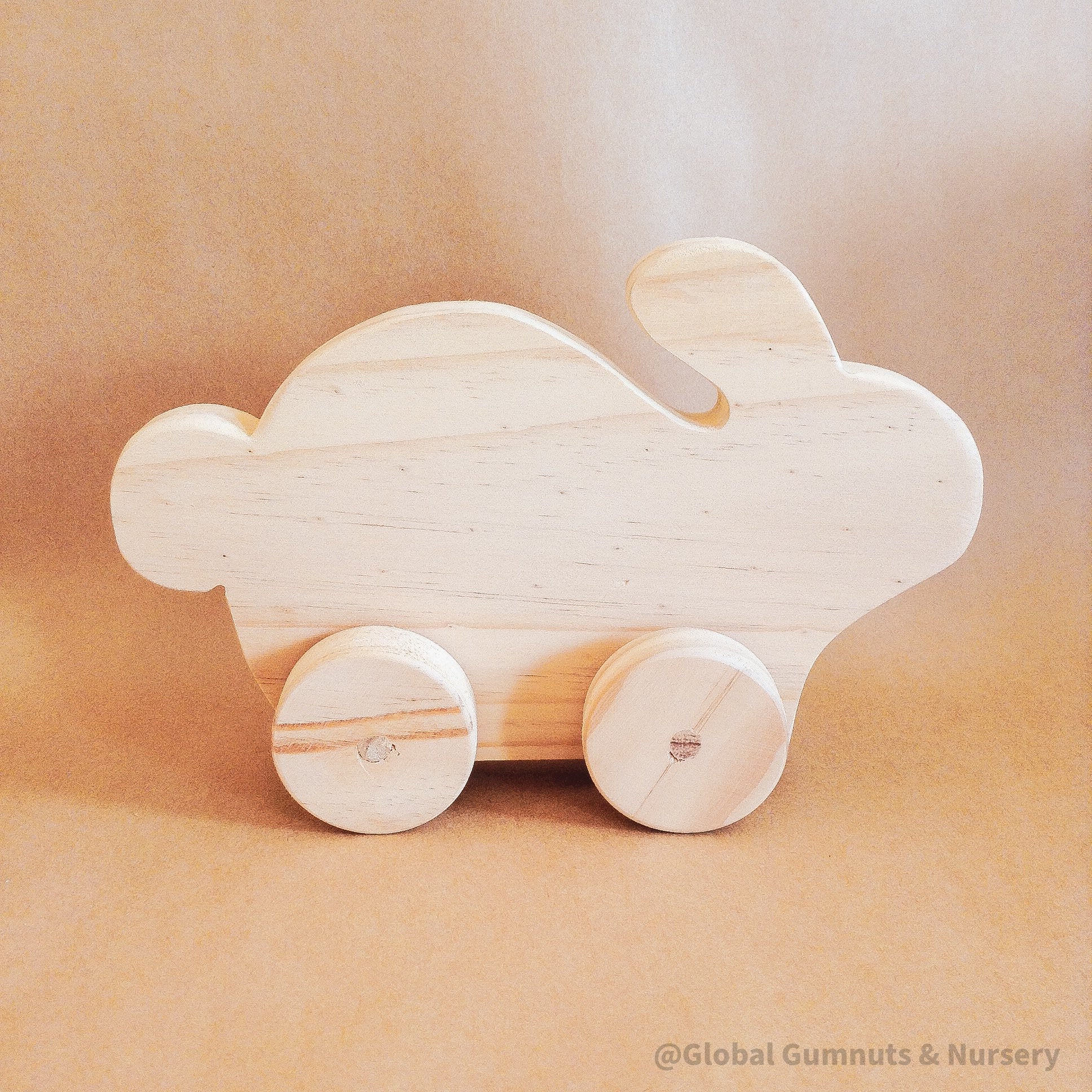Handmade Wooden Bunny: Wooden bunny for Easter-themed play or decoration.