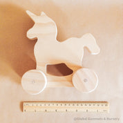 Unicorn Push-Pull Toy: Handmade unicorn wheely toy for imaginative play.