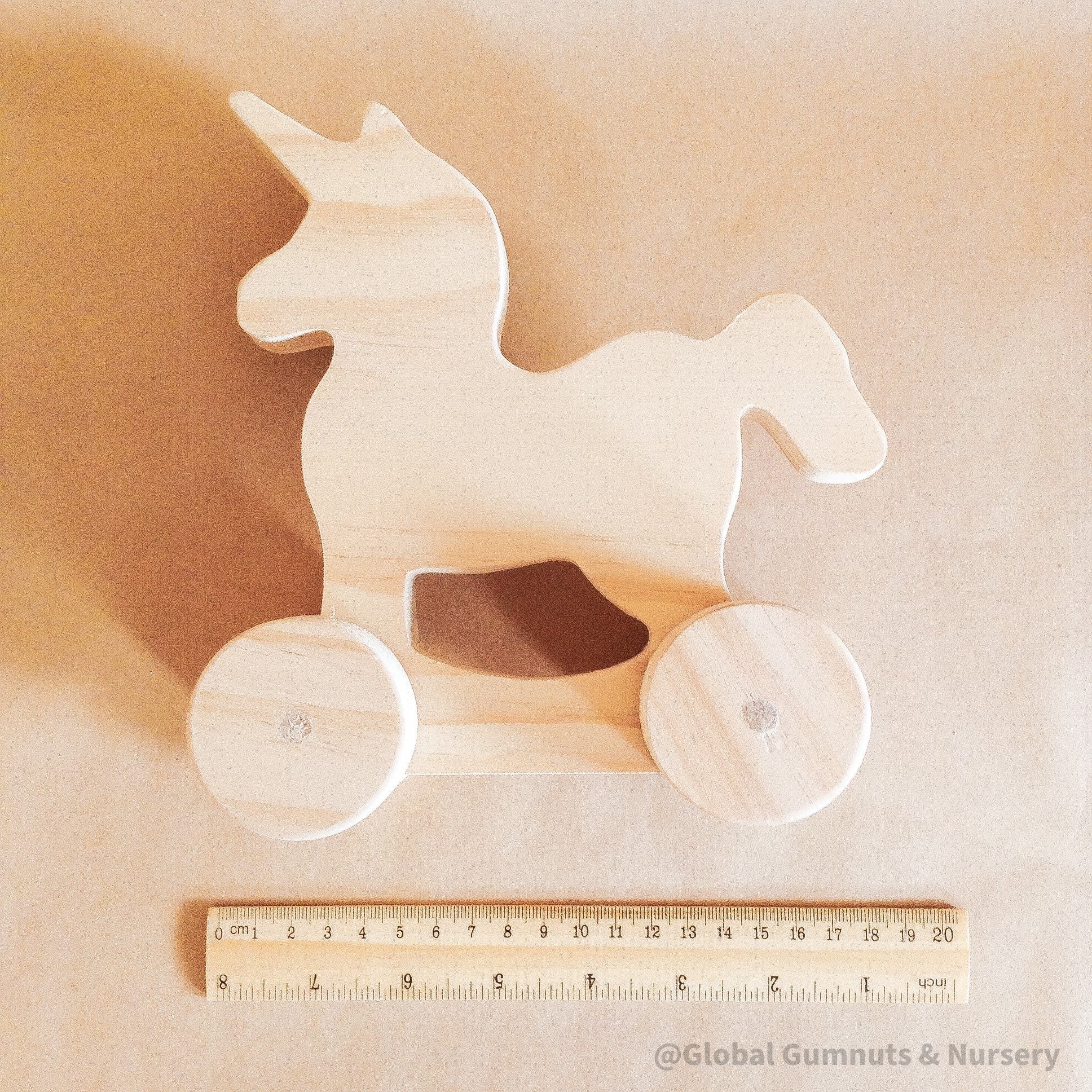 Unicorn Push-Pull Toy: Handmade unicorn wheely toy for imaginative play.