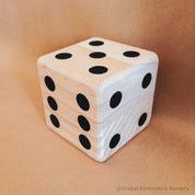 Oversized wooden dice, perfect for garden games, party entertainment, or creative displays.