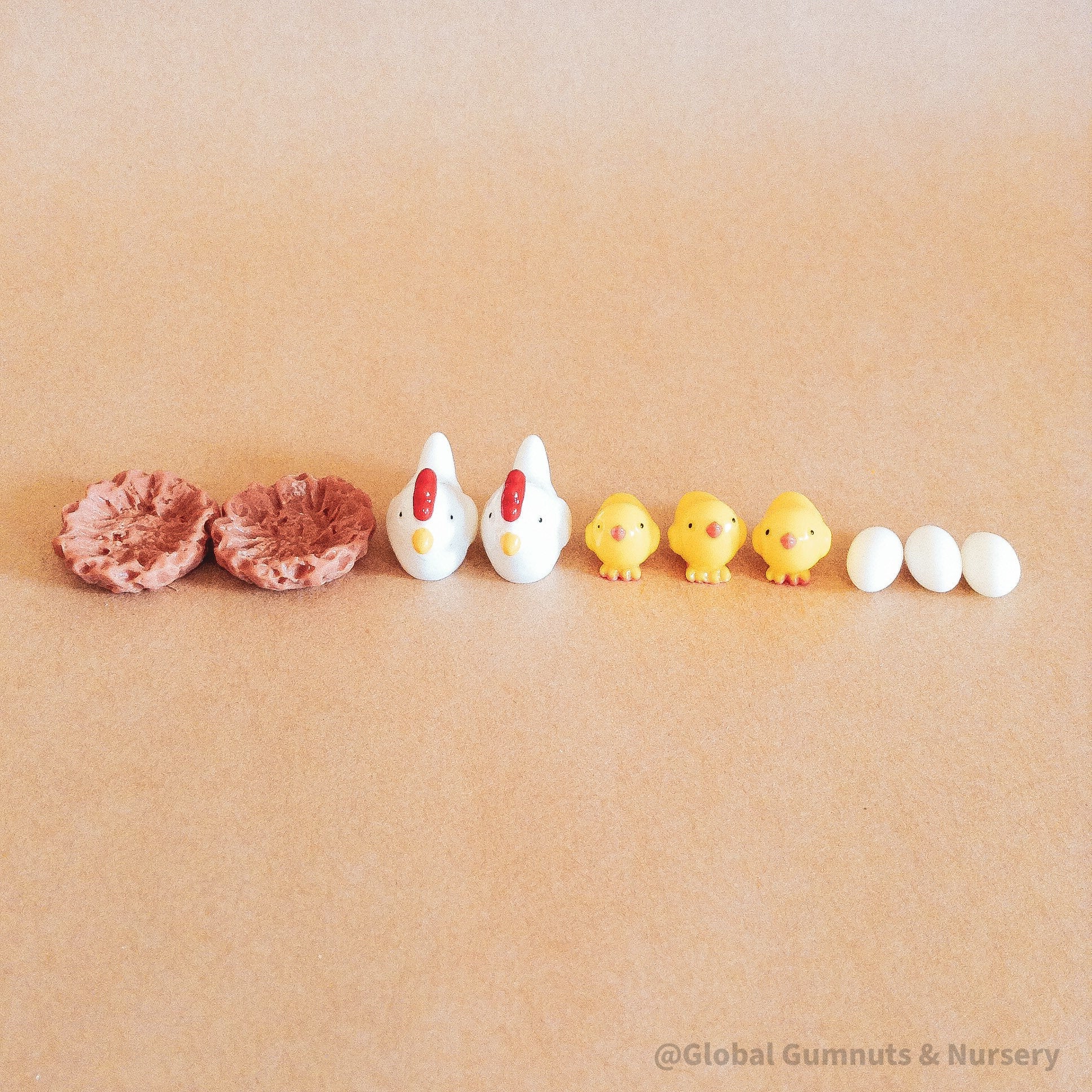 resin chickens & chicks set: mini resin chicken family set, perfect for crafting or farm-themed decor.